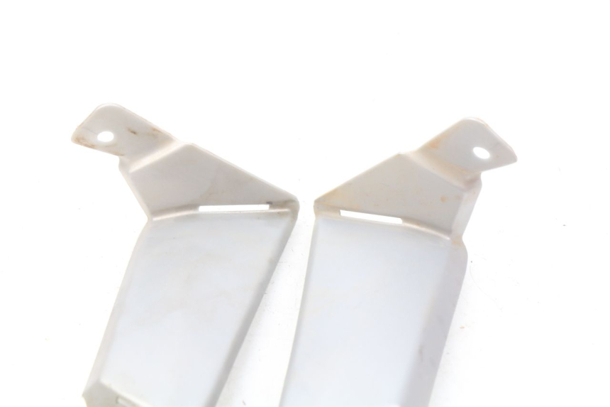 photo de TAMPA LATERAL DO CHASSI YAMAHA YFM R RAPTOR 90 (2017 - 2023) - Detalhe da peça