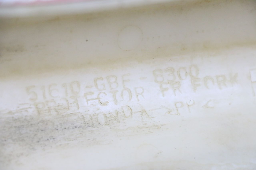 photo de TAMPA DO GARFO HONDA CR 85 (2003 - 2007) - Detalhe da peça