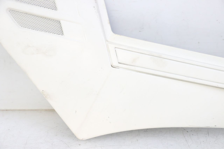 photo de TAMPA LATERAL ESQUERDA SOB O BANCO YAMAHA FJ 36Y 1100 (1984 - 1985) - Ampliação técnica