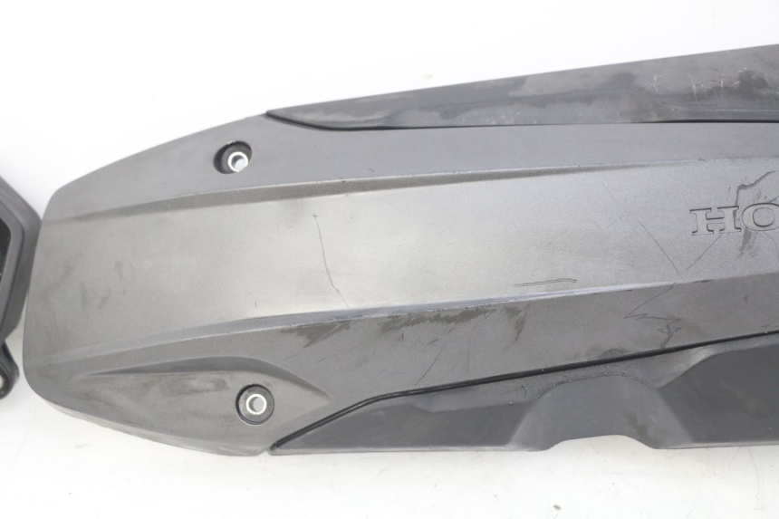photo de TAMPA DE TRANSMISSÃO HONDA FORZA 125 (2015 - 2016) - Estado da superfície
