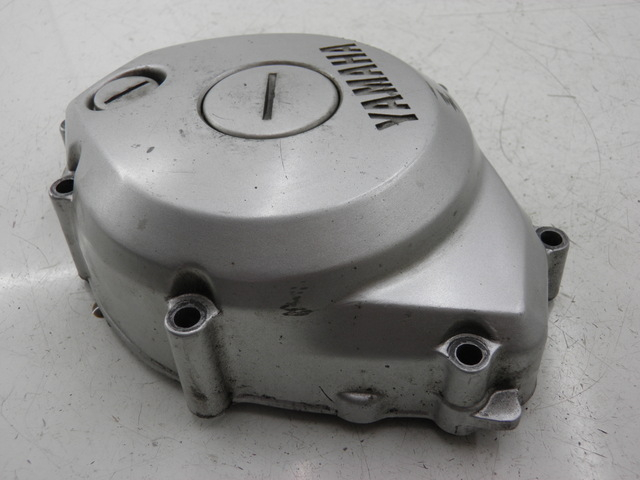 photo de TAMPA DO ALTERNADOR YAMAHA YBR 125 (2004 - 2006) - Detalhe da peça