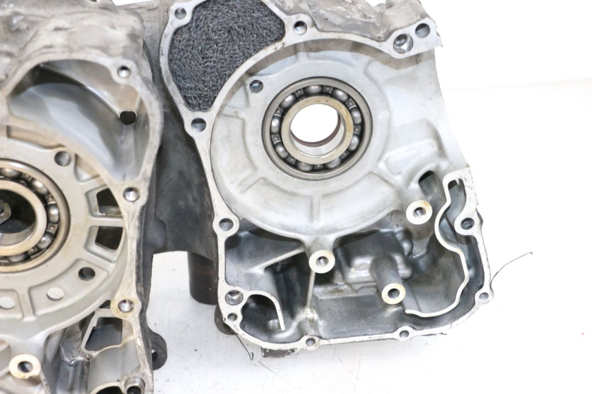 photo de CARCAÇA INFERIOR DO MOTOR SUZUKI BURGMAN 125 (2007 - 2014) - Peça verificada