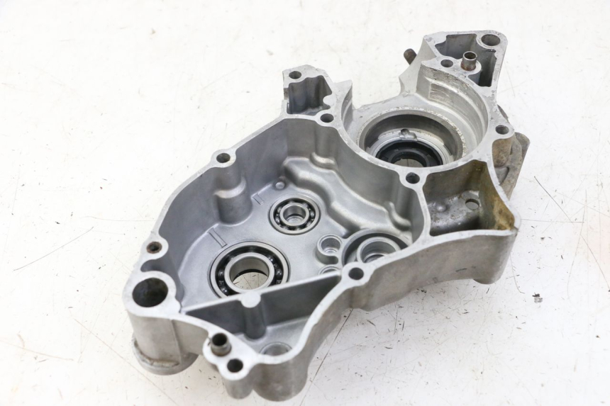 photo de TAMPA LATERAL ESQUERDA DO MOTOR KAWASAKI KX 65 (2000 - 2019) - Zoom de qualidade