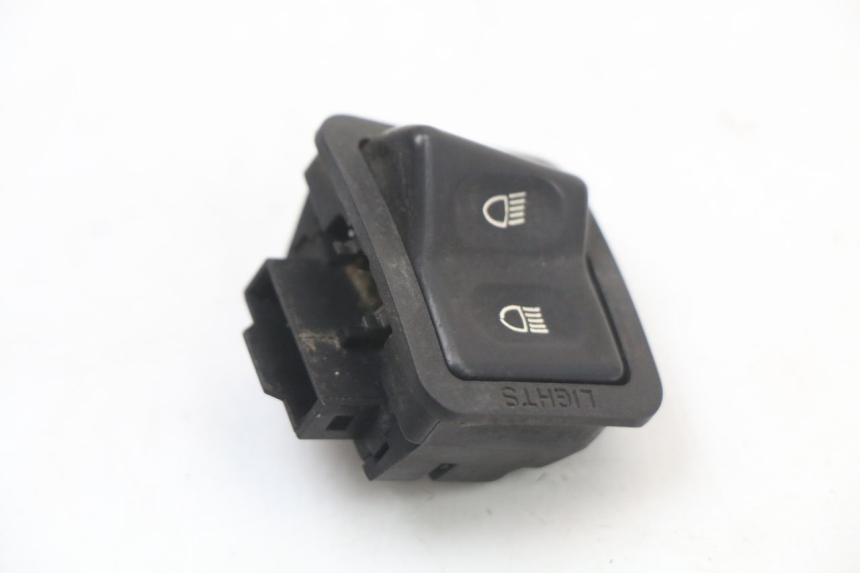 photo de INTERRUPTOR DO FAROL ALTO SYM ORBIT 50 (2008 - 2010) - Detalhe da peça