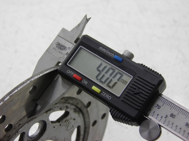 photo de DISCO DE FREIO DIANTEIRO BHM REVENGER 50 (2009 - 2015) - Zoom do estado de desgaste