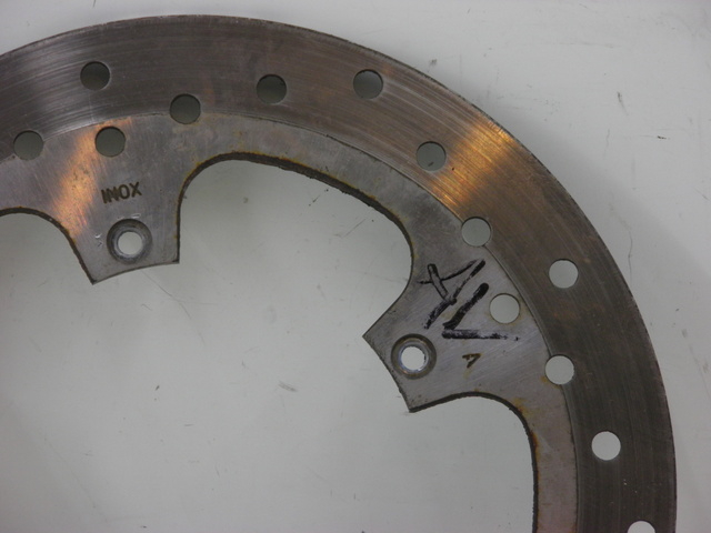 photo de DISCO DE FREIO DIANTEIRO PIAGGIO XEVO - X EVO 125 (2010 - 2015) - Zoom do estado de desgaste