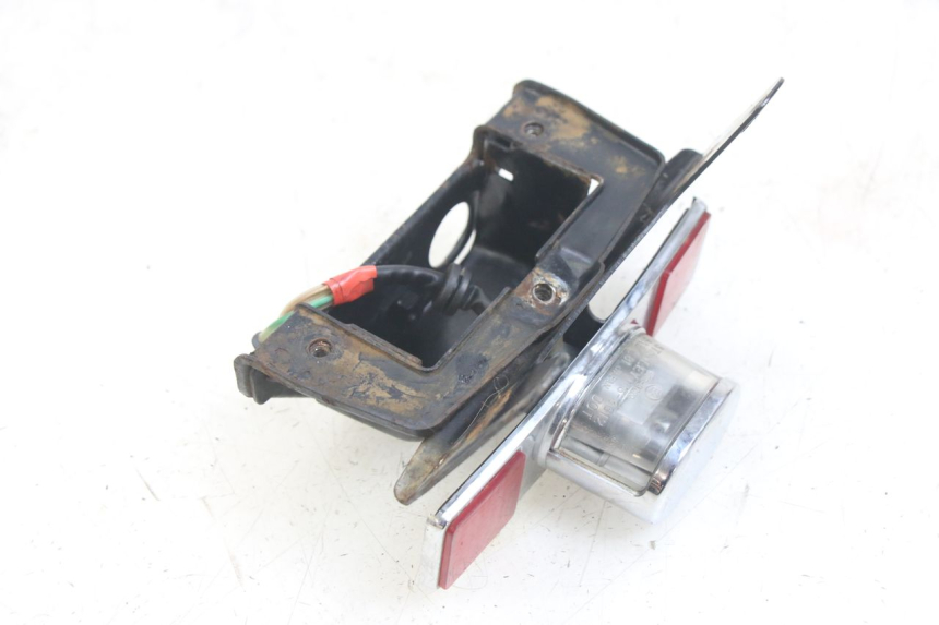photo de ILUMINAÇÃO DE PLACA HONDA CA REBEL 125 (1995 - 2001) - Detalhe da peça