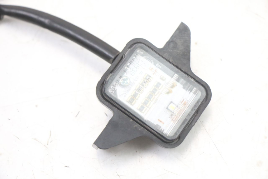 photo de ILUMINAÇÃO DE PLACA HONDA PCX (JF57/JF64) 125 (2014 - 2018) - Detalhe da peça