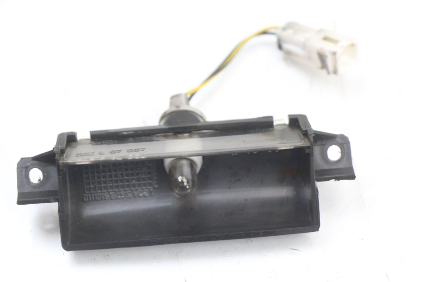 photo de ILUMINAÇÃO DE PLACA PIAGGIO MP3 125 (2006 - 2014) - Zoom do estado de desgaste
