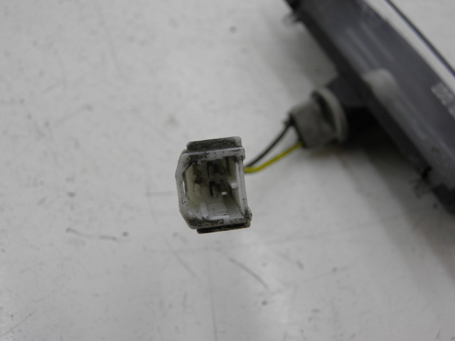 photo de ILUMINAÇÃO DE PLACA PIAGGIO MP3 RL 125 (2006 - 2014) - Detalhe da peça