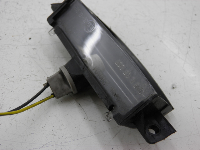 photo de ILUMINAÇÃO DE PLACA PIAGGIO MP3 RL 125 (2006 - 2014) - Zoom do estado de desgaste