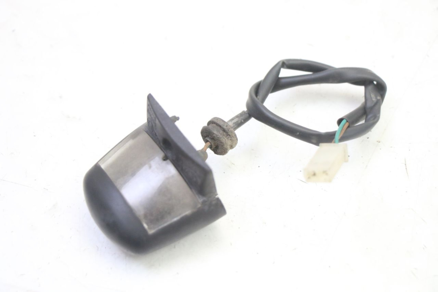 photo de ILUMINAÇÃO DE PLACA PEUGEOT SATELIS 250 (2006 - 2012) - Zoom do estado de desgaste