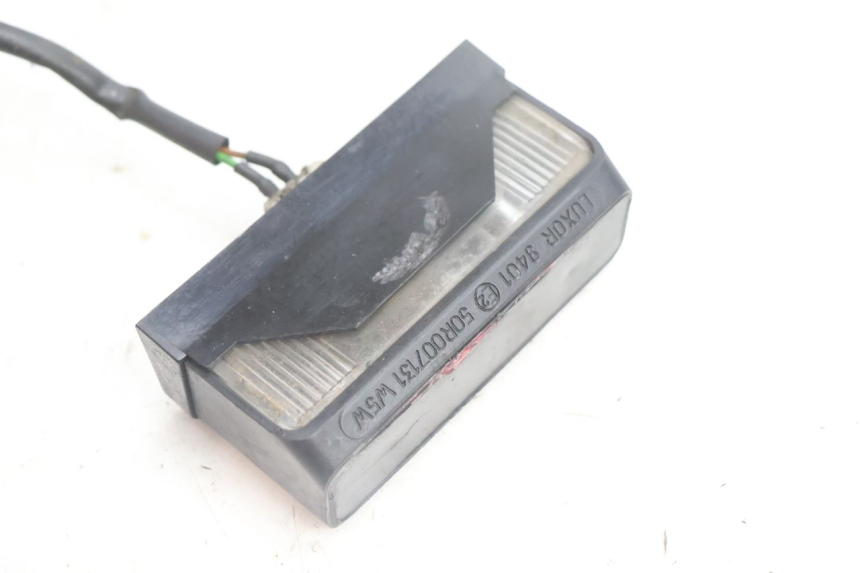 photo de ILUMINAÇÃO DE PLACA PEUGEOT VIVACITY 100 (1999 - 2008) - Detalhe da peça