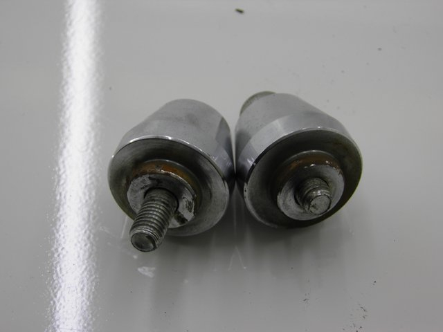 photo de TAMPA DO GUIDÃO DAELIM S2 125 (2008) - Detalhe da peça