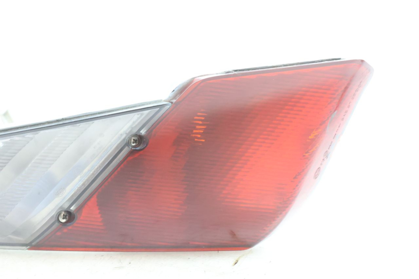photo de LUZ TRASEIRA ESQUERDA APRILIA ATLANTIC S 125 (2010 - 2013) - Zoom do estado de desgaste