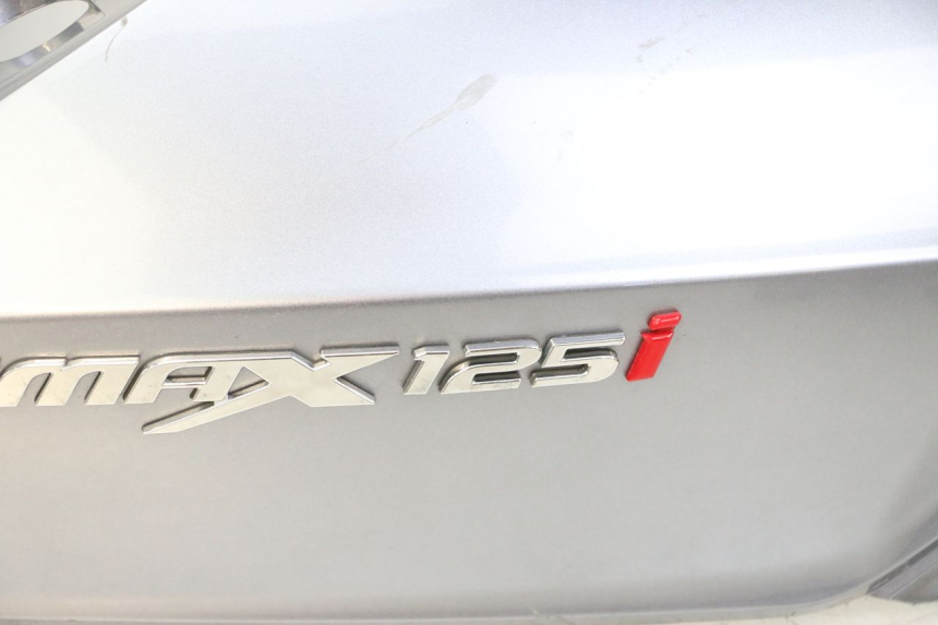 photo de LATERAL TRASEIRO DIREITO SYM JOYMAX 125 (2010 - 2017) - Marcações e referências