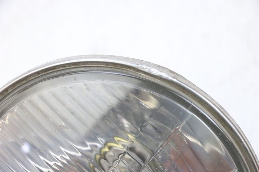 photo de FUNDO DO FAROL HONDA NTV REVERSE 650 (1988 - 1988) - Detalhe da peça