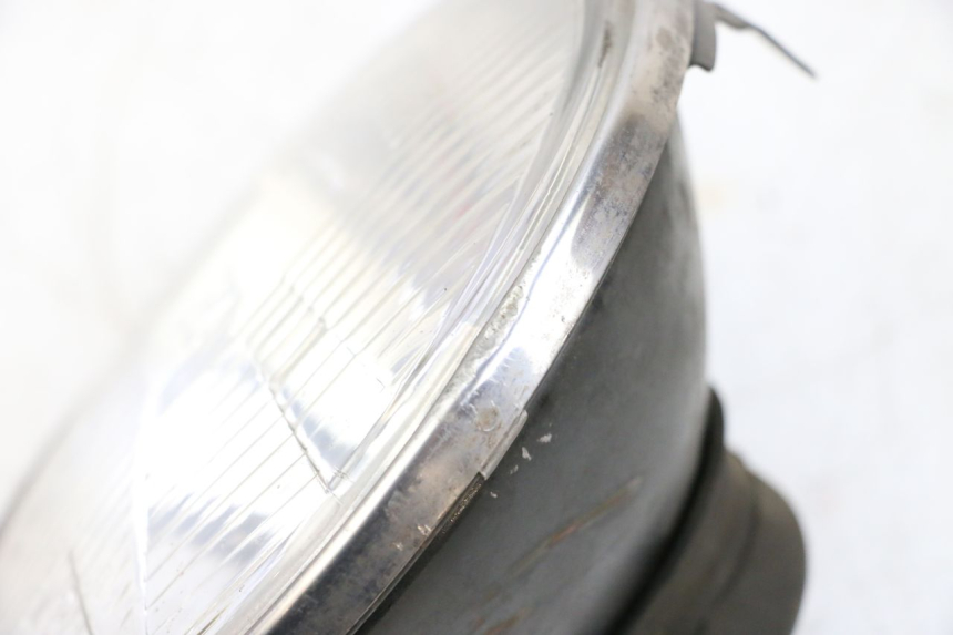 photo de FUNDO DO FAROL HONDA NTV REVERSE 650 (1988 - 1988) - Zoom do estado de desgaste