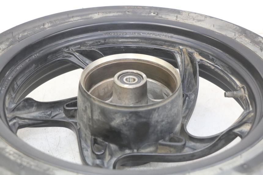 photo de ARO TRASEIRO SYM WOLF SB 125 (2011 - 2018) - Zoom do estado de desgaste
