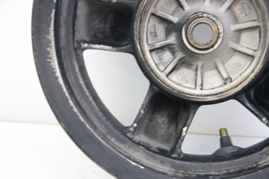 photo de ARO TRASEIRO PIAGGIO ZIP 2T 50 (2009 - 2019) - Zoom do estado de desgaste