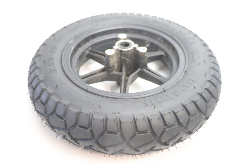 photo de ARO DIANTEIRO E PNEU TNT MOTOR ROMA 10' 2T 50 (2011 - 2018) - Detalhes característicos