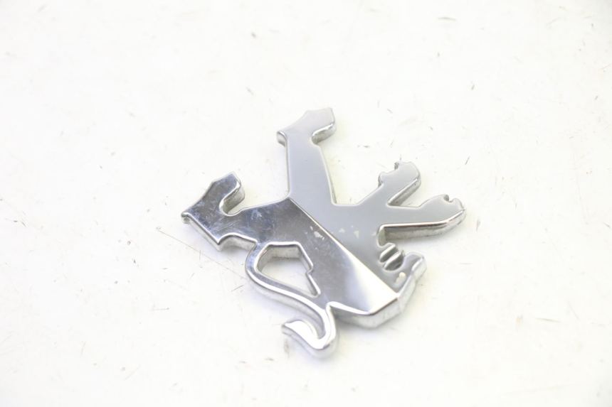 photo de LOGO DA MARCA PEUGEOT ELYSTAR 50 (2002 - 2014) - Detalhe da peça