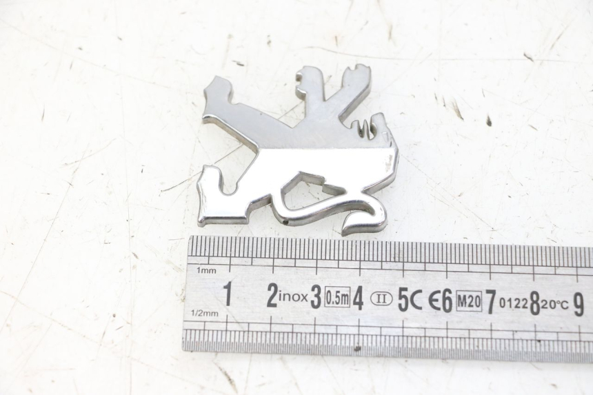 photo de LOGO DA MARCA PEUGEOT ELYSTAR 50 (2002 - 2014) - Detalhe da peça