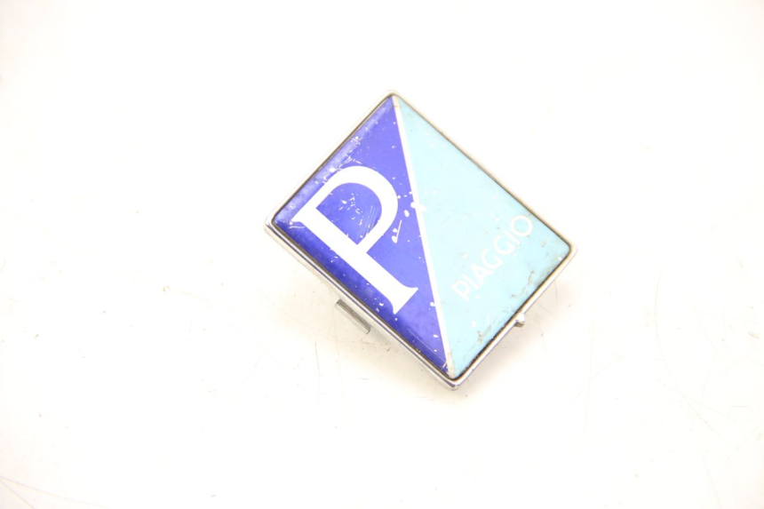 photo de LOGO DA MARCA PIAGGIO VESPA LX 2T 50 (2005 - 2013) - Detalhe da peça