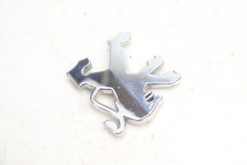 photo de LOGO DA MARCA PEUGEOT VIVACITY 50 (2004 - 2009) - Detalhe da peça