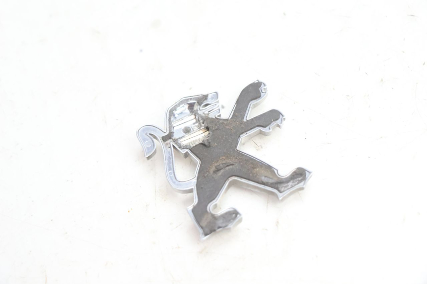 photo de LOGO DA MARCA PEUGEOT VIVACITY 50 (2004 - 2009) - Zoom do estado de desgaste