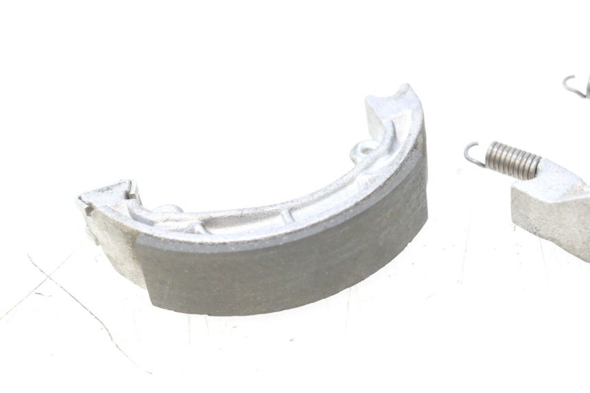 photo de SAPATA DE FREIO JM MOTORS F45i 4T 50 (2020 - 2023) - Detalhe da peça