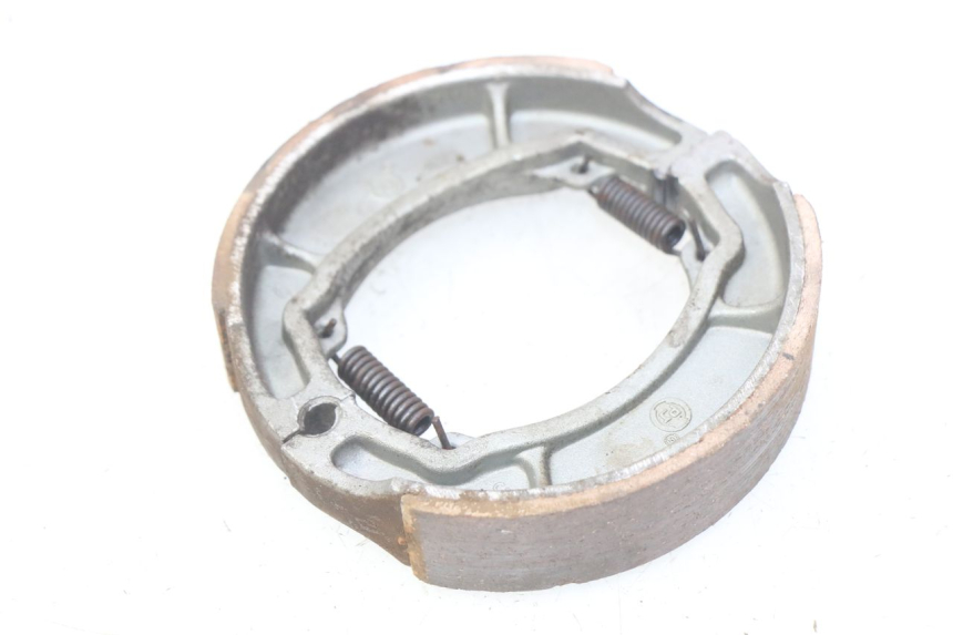 photo de Sapata de travão YAMASAKI YM T 125 (2015 - 2020) - Detalhe da peça