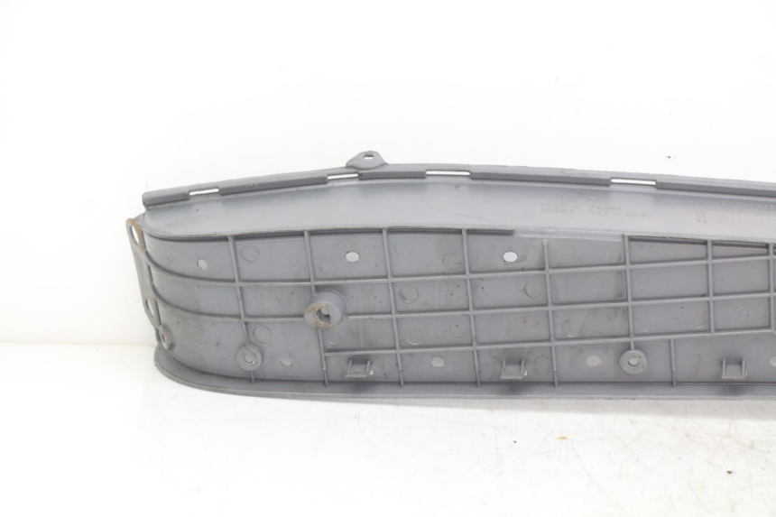 photo de ESTRIBO DIREITO HONDA FES PANTHEON 2T 125 (1998 - 2002) - Zoom do estado de desgaste