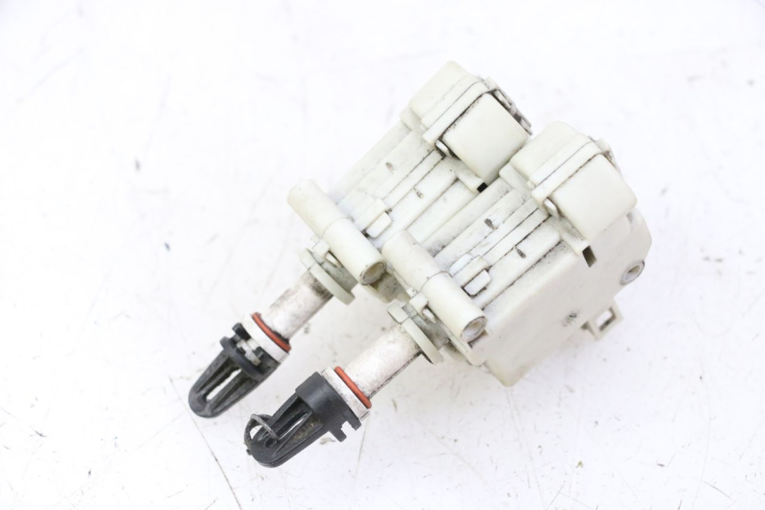 photo de MOTOR DE ABERTURA DO BAÚ PIAGGIO MP3 500 (2011 - 2015) - Zoom do estado de desgaste