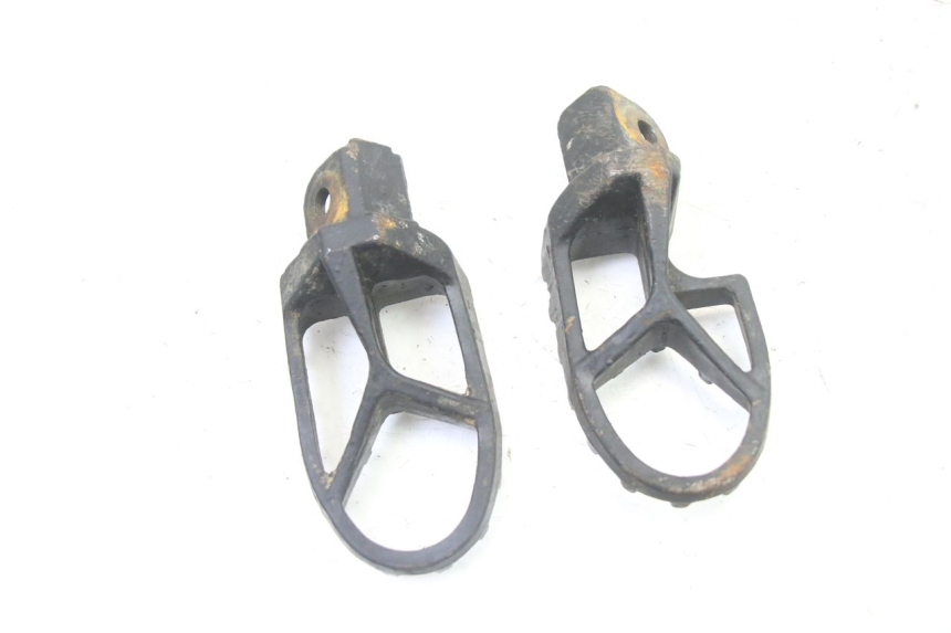 photo de PAR DE APOIO PARA OS PÉS DIANTEIRO APOLLO RXF 125 - Pontos de fixação
