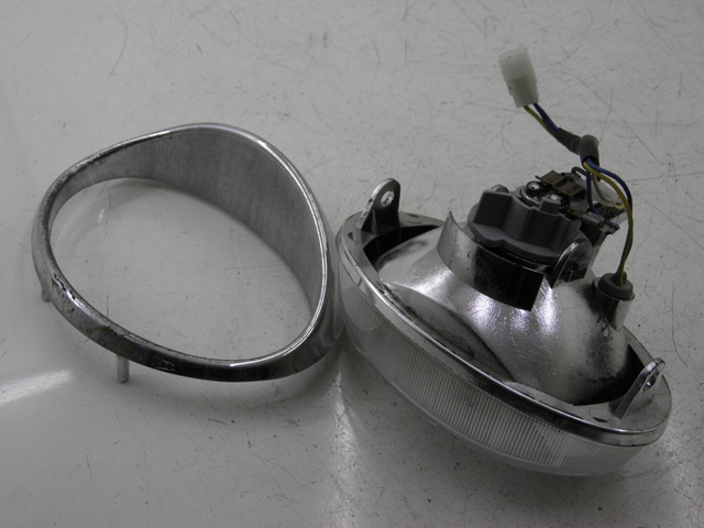 photo de FAROL DIANTEIRO APRILIA SCARABEO 100 (2003 - 2012) - Zoom do estado de desgaste