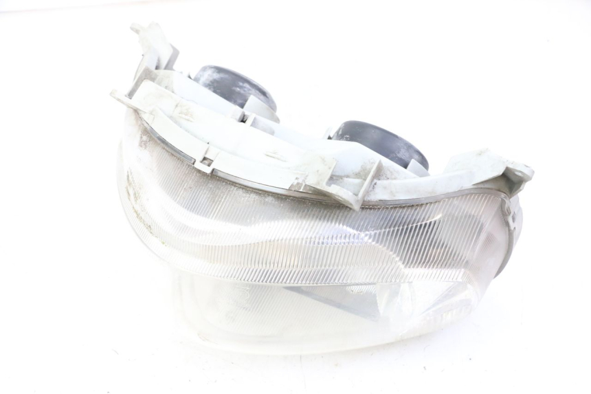 photo de FAROL DIANTEIRO SUZUKI BURGMAN 125 (2007 - 2014) - Estado da superfície