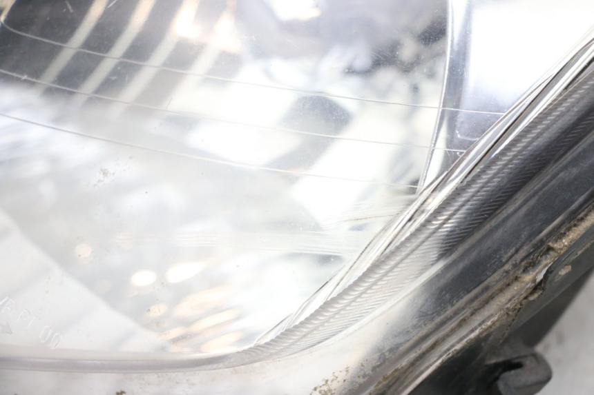 photo de FAROL DIANTEIRO YAMAHA CYGNUS X 125 (2004 - 2007) - Estado da superfície
