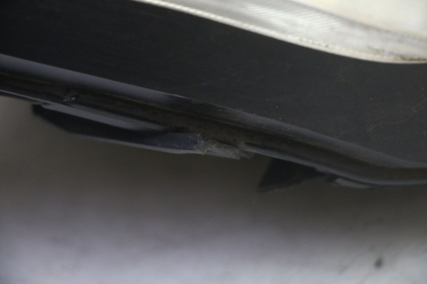 photo de FAROL DIANTEIRO YAMAHA CYGNUS X INJECTION 125 (2007 - 2013) - Zoom do estado de desgaste