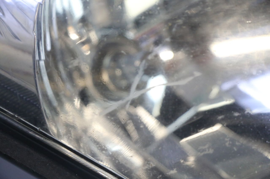 photo de FAROL DIANTEIRO SUZUKI DL V STROM 1000 (2002 - 2007) - Zoom do estado de desgaste