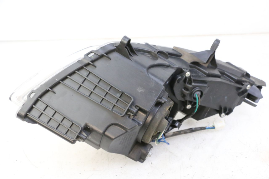 photo de FAROL DIANTEIRO DIREITO SYM JOYMAX 125 (2010 - 2017) - Marcações e referências