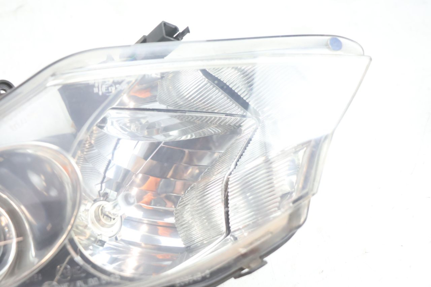 photo de FAROL DIANTEIRO DIREITO PEUGEOT SATELIS 125 (2006 - 2009) - Zoom do estado de desgaste