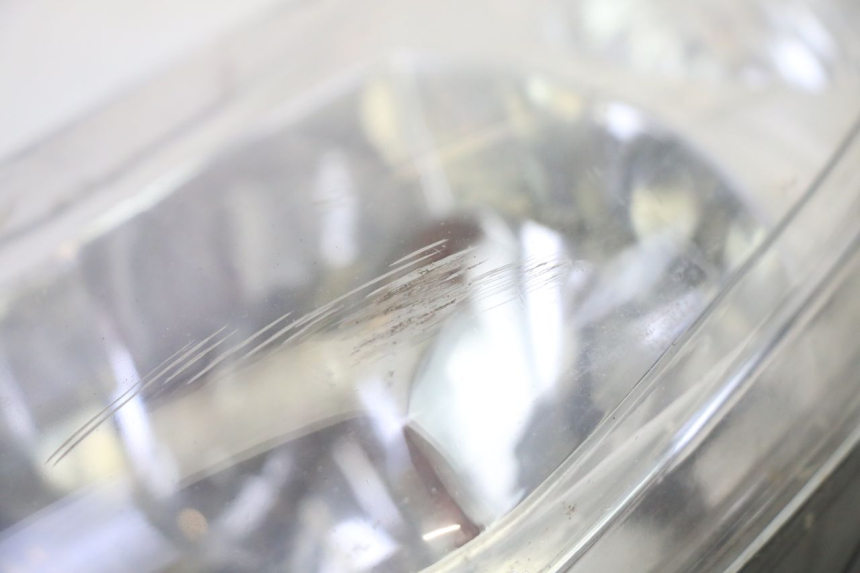 photo de FAROL DIANTEIRO PEUGEOT ELYSTAR 50 (2002 - 2014) - Zoom do estado de desgaste