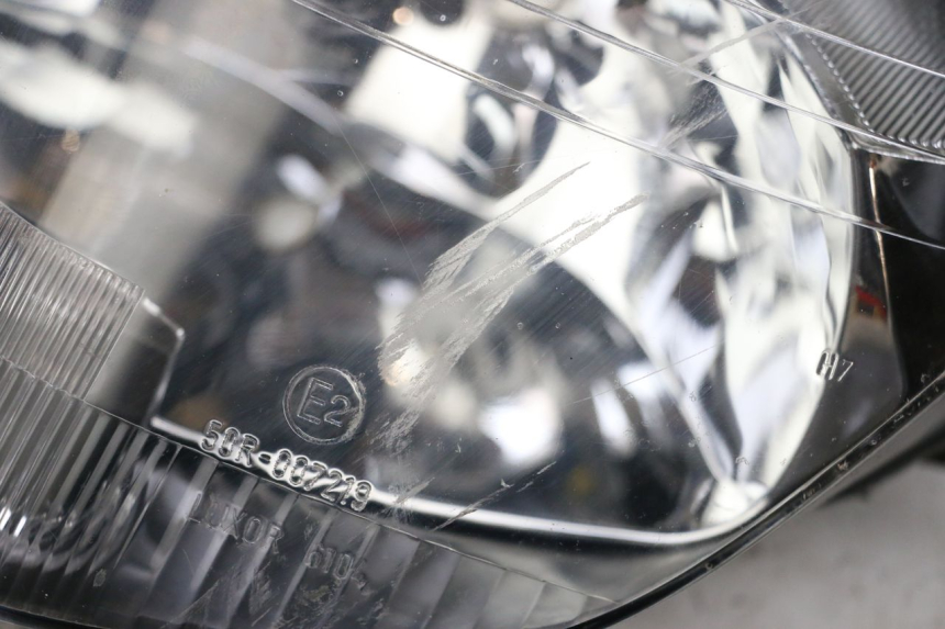 photo de FAROL DIANTEIRO HONDA FES PANTHEON 2T 125 (1998 - 2002) - Estado da superfície