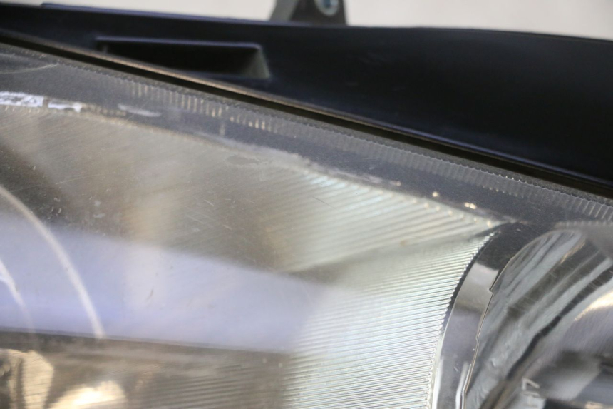 photo de FAROL DIANTEIRO HONDA FES PANTHEON 125 (2003 - 2007) - Pontos de fixação