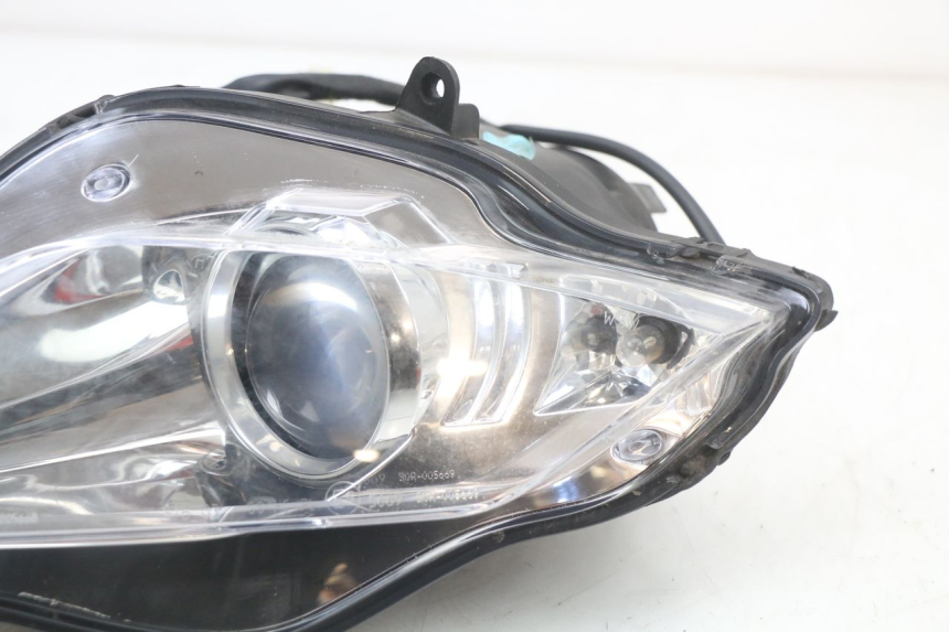 photo de FAROL DIANTEIRO ESQUERDO PEUGEOT GEOPOLIS RS 125 (2007 - 2009) - Zoom do estado de desgaste