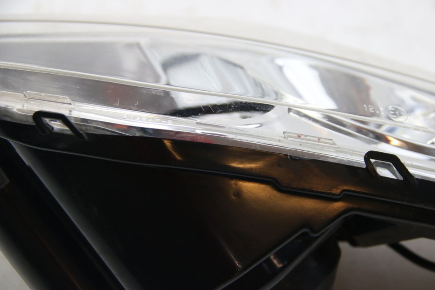 photo de FAROL DIANTEIRO ESQUERDO PEUGEOT SATELIS 125 (2006 - 2009) - Estado da superfície