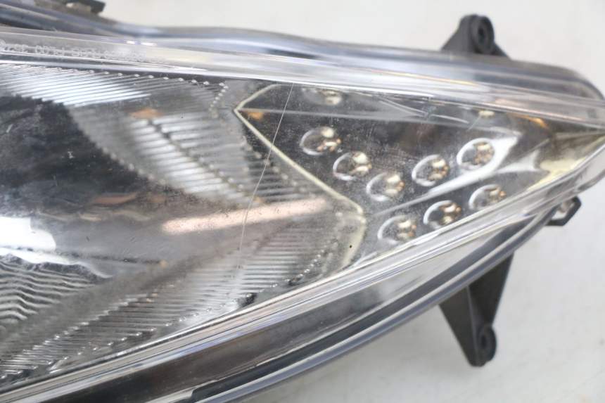 photo de FAROL DIANTEIRO ESQUERDO PEUGEOT SPEEDFIGHT 3 AIR 50 (2009 - 2015) - Detalhe da peça