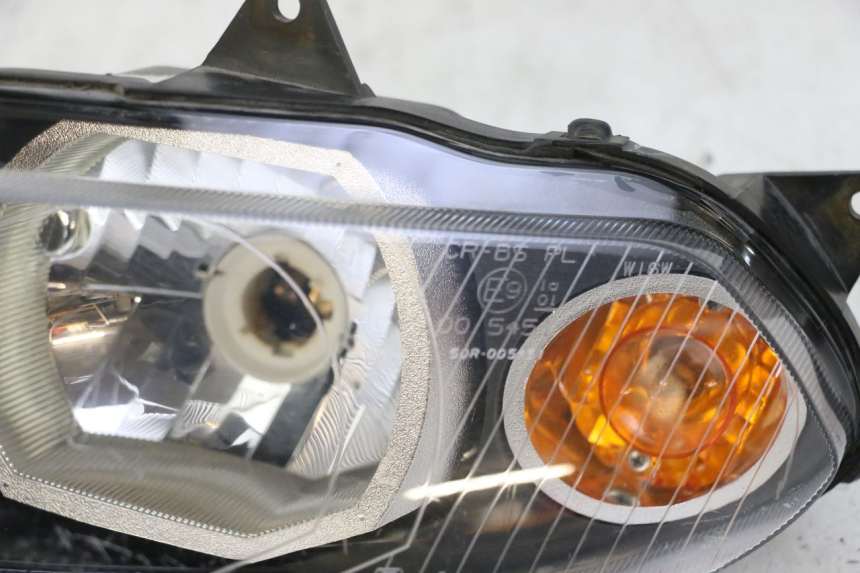 photo de FAROL DIANTEIRO ESQUERDO YAMAHA TZR 50 (2008 - 2016) - Estado da superfície