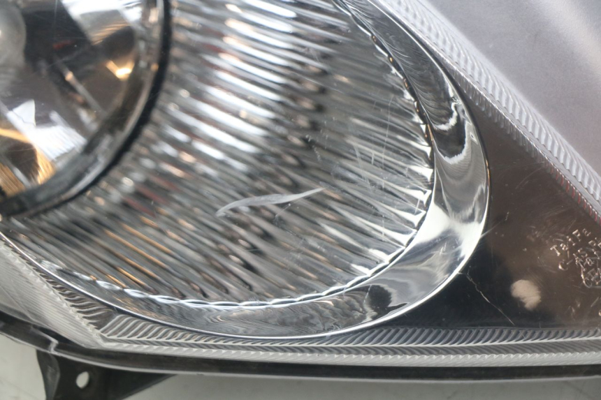 photo de FAROL DIANTEIRO TNT MOTOR GRIDO 2T 50 (2010 - 2019) - Detalhe da peça